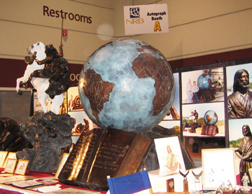 Front view of a globe sculpture at an exhibition display