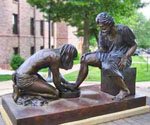 Close view of the foot-washing scene in Divine Servant® outdoors