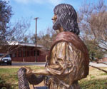 Profile of Fisher of Men® with bare trees behind