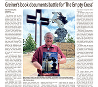 Newspaper article about Greiner's book and The Empty Cross™, with a photograph of the artist holding the book