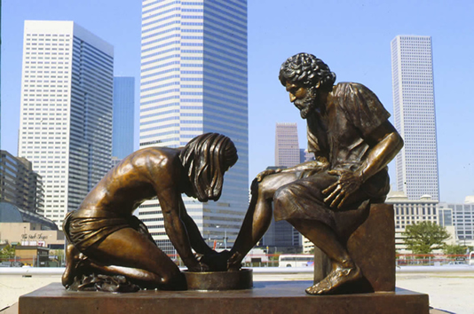 Divine Servant® displayed against a backdrop of city skyscrapers