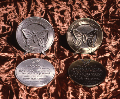 Christian Butterfly® medallions showing front emblems and reverse inscriptions