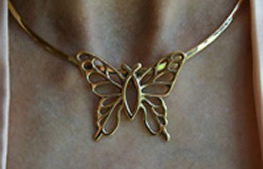 Christian Butterfly® necklace worn at the neck