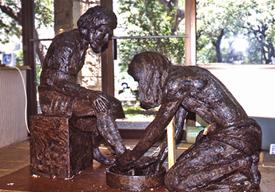 Developing Divine Servant® sculpture in an open-air work area