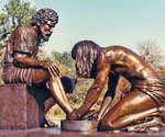 Divine Servant® showing Jesus washing Peter's feet in an outdoor setting