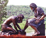 Divine Servant® showing Jesus washing Peter's feet in an outdoor setting