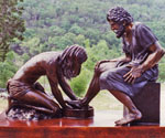 Divine Servant® showing Jesus washing Peter's feet in an outdoor setting