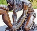 Detail of Jesus' hands, robe and the foot-washing basin