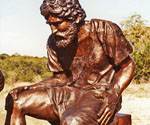 Front detail of Peter's seated figure with his raised knee