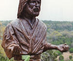 Detail of the modeled robe, face and extended hand