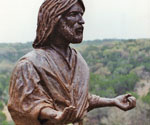 Detail of the modeled robe, face and extended hand