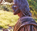 Side-profile view of the modeled face and flowing hair of Fisher of Men®