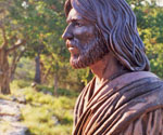 Side-profile view of the modeled face and flowing hair of Fisher of Men®