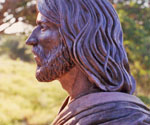 Side-profile view of the modeled face and flowing hair of Fisher of Men®