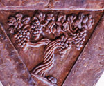 Base panel with a relief of a heart, grapes and leaves