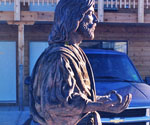 Fisher of Men® displayed outdoors near a building