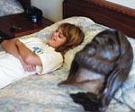 Person reclining on a sofa indoors