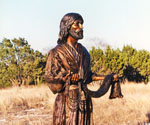 Fisher of Men® holding a fishing net in a natural landscape