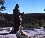 Fisher of Men® silhouetted against the bright sky
