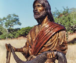 Upper-body view of Fisher of Men® holding the fishing net outdoors