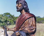 Upper-body view of Fisher of Men® holding the fishing net outdoors