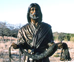 Upper-body view of Fisher of Men® holding the fishing net outdoors
