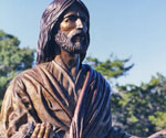 Close view of the face and robe collar of Fisher of Men®