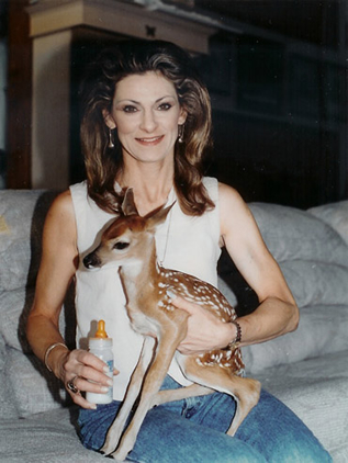 Sherry Greiner holding a fawn