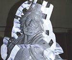 Clamped mold section showing the rider's crown and flowing hair