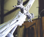 Low-angle view of the sword, hand and flowing sleeve