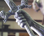 Close-up of the sword hand and crossguard from another angle