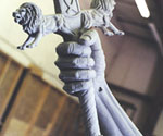 Front view of the rider's hand around the sword handle