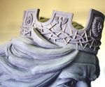 Rear detail of the decorated crown and flowing hair