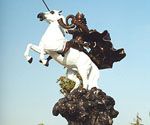 Side view of The Coming King® sculpture in an outdoor courtyard
