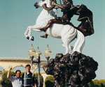 Visitors standing below The Coming King® to show its scale