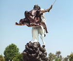 Rear three-quarter view of The Coming King® with the sword arm raised
