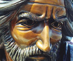 Close-up of The Coming King® rider's bronze face beneath the decorated crown