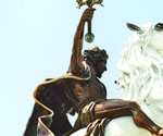 Low-angle view of The Coming King® showing the raised sword and white horse