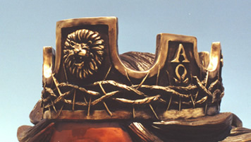 Decorated crown with lettering and relief details