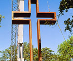 The Empty Cross™ upright beside installation equipment